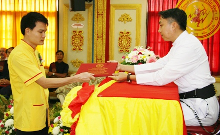 Father Peter presented graduation certificates to the students.