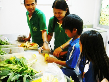 Preparing the food for the animals.