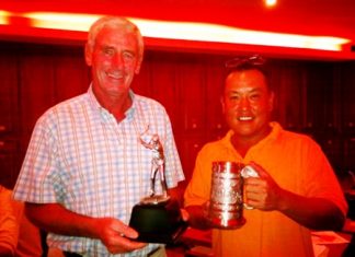 Sunday’s low gross winner Seamus Cotter, left, and medal winner John Bahng.