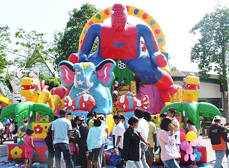 Kids enjoy the bouncy castle at Alcazar.