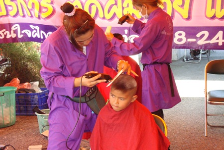 Youngsters are given free hair cuts at Alcazar.