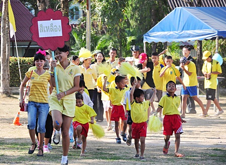 Children’s day at the Pattaya Orphanage begins with a parade of colors for their annual fun sports event. Elsewhere throughout the kingdom, fun activities and shows were put on just for children on their day, whilst the Prime Minister sent out a communiqué urging youngsters to be careful and mindful of others and become solid resources for the country’s future growth.