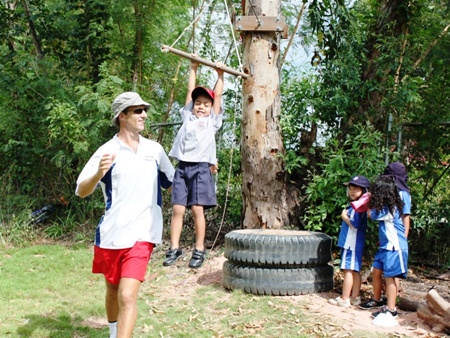 Hanging on tight as they shoot down the zip wire.