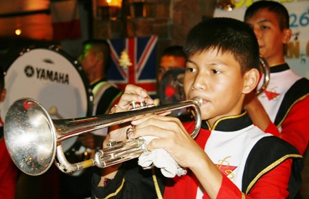 The marching band from Pattaya School No. 3 entertains the children.