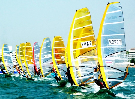 An international line up of windsurfers takes to the water off Jomtien beach during the final round of the 2010 Windsurfing Thailand Championships.