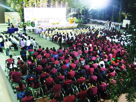 Father Lawrence Patin’s children gather to show their sadness.