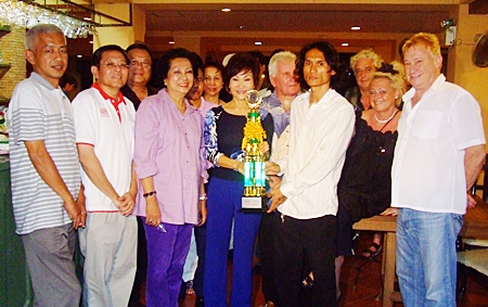 The trophy is presented to the winning Bangkok team.