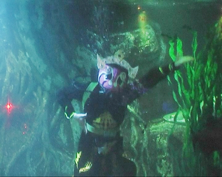 Face Changing Artist Performs at Underwater World