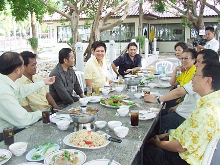 The Naklua Songkran organizing committee meets at Plathong Restaurant to discuss preparations for the Naklua Wan Lai Festival. 