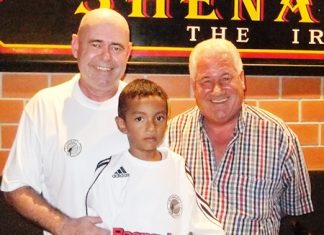 Former Gateshead and Blyth Spartans goalkeeper George Alberts and Shenanigans Manager Stewart Fraser have set up the first Gateshead Supporters Club in Asia at Shenanigans Bar in Jomtien. Seen in the picture are George, Stewart and his adopted son Inn in Gateshead shirts ahead of this week’s 1st Round FA Cup match between Blyth and Gateshead. Gateshead’s finest FA Cup run was ended 0-1 at home to Bolton Wanderers (the year of the Matthews Final) in a quarter final tie in 1953. Gateshead beat Liverpool 1-0 in this remarkable FA Cup run.