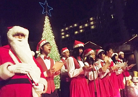 Santa joins the choir at the Montien Hotel Pattaya.