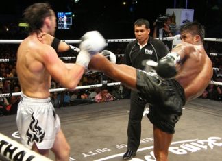 Buakaw Por. Pramuk, right, lands a high kick on Russia’s Zaripow Zaripow Rastem during their 70kg contest.