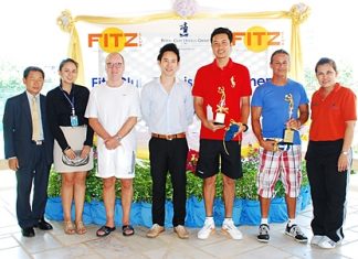 Winners of the first Fitz Club tennis tournament are presented with their trophies.