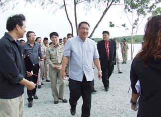 Deputy Prime Minister and Finance Ministry Chief Kittiratt Na-Ranong and his entourage of top government officials arrive to inspect Mabprachan reservoir.