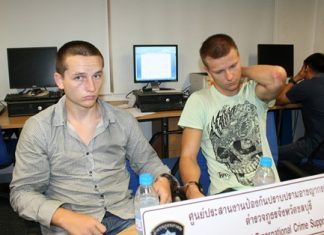 Lithuanian students Marius Giedriunas and Dangis Valkauskas have been arrested in possession of 30 counterfeit ATM cards, $460 cash, two black caps and a plastic mask.