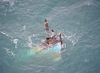 The tip of the bow is all that’s visible of the sunken vessel.