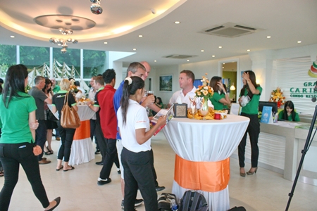 Local realtors mingle with sales staff at the Grande Caribbean agents’ day, held August 25. 