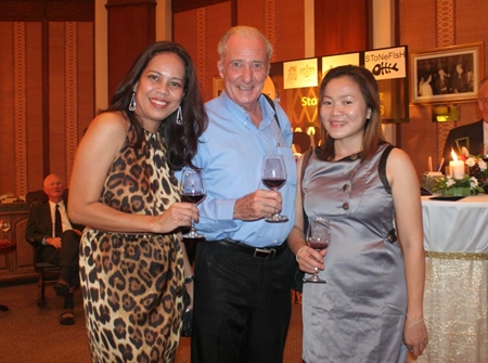 A doctor between two roses (l-r) Teatree Spa Manager Papakan “Jeena” Saguansap, Dr. Iain and Som Corness.