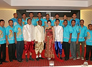 (Center, left to right) Takientia Deputy Mayor Arun Nuandet, Takientia Mayor Manop Prakorbthum, former Miss Thailand World Panadda “Boom” Wongphudee, and Takientia Deputy Mayor Mitchai Prakorbthum announce the event surrounded by staff.