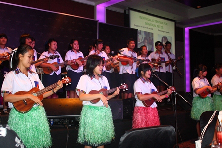 Students from Mechai Pattana School give rousing ukulele performance.