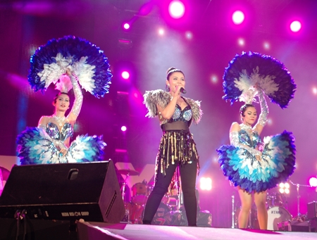 Taktaen Cholada and her beautiful dancers rock the stage on the final day of Pattaya International Music Festival. A year after crowds shunned the 2012 festival due to royal funerals and Songkran, the March 22-24 festival again filled Pattaya with nearly a half-million visitors who, the Tourism Authority of Thailand estimated, spent about 300 million baht. Four stages were filled with music and enthralled audiences for a festival unblemished by violence. 