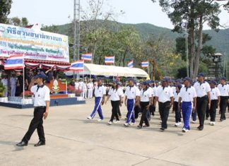 National defense volunteers march in a parade in Sattahip to commemorate Thailand National Defense Volunteer Day.