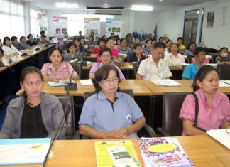 Cooks and vendors listen to a lecture about food-safety laws in Sattahip.
