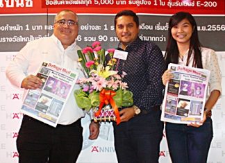 Kamolthep Malhotra, GM of Pattaya Mail Media Group, presents flowers to Volker Hellstern, MD of Hafele (Thailand) Limited, with Pawinee Kaewkert, during Hafele’s 90th Anniversary celebration.