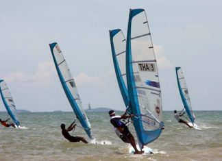 Sailors compete at the 2013 Thailand Windsurfing Championships held at Jomtien Beach, Pattaya.