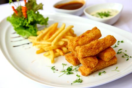 Breaded fish fillet with French fries at Cascade.