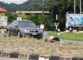 Police were able to wake up and chase off this homeless man before he rolled out into traffic in his sleep.