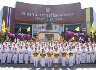 Novice monks line up outside City Hall at last year’s dedication to HM the King.