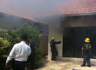 Firefighters tend to one of two fires at View Talay Villas which they believe might have been set to mask a burglary.