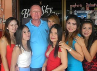 Dan ‘the Diet Whiskey Man’ (3rd left) celebrates golfing victory and his birthday with the staff at Blue Sky Bar.