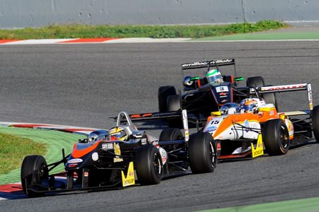 Stuvuk leads a group of three cars through a corner during the European Formula 3 Open Championship season ending race weekend in Barcelona.