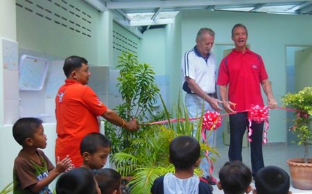 William and Woody cut the ribbon.