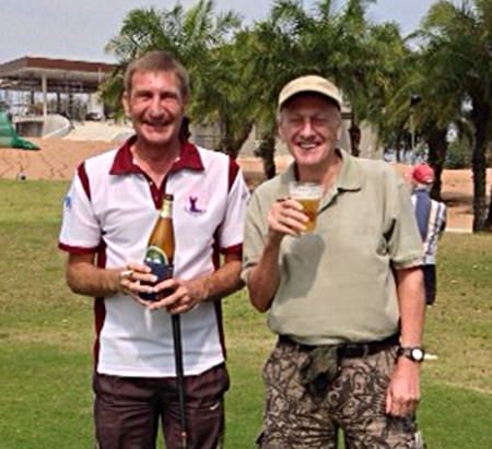 Neil Griffin (right) celebrates a rare win with Skinny Newton on the 1st tee at Greenwood.