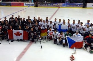 The 2 teams line up together after the game. (Photo/Julie Lestage)