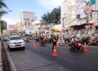 Police set up traffic check-points before Songkran in front of the Royal Garden Plaza.