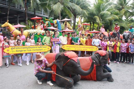 Nong Nooch elephants blast revelers during Songkran water play ...