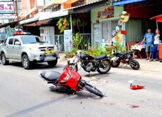 Police arrive on the scene of this Songkran related accident. About 1,000 police officers and volunteers are on patrol for the Songkran finale this weekend.