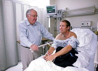 Erik Compton with father, Peter, in August 2008, three months after the second transplant.