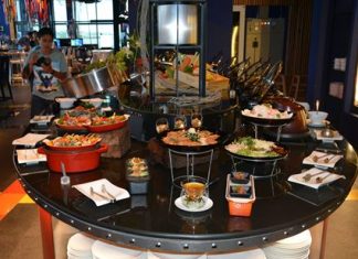 The buffet station offers a variety of seafood and Thai dishes.