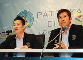 Pattaya spokespeople Damrongkiat Phinitkan (left) and Banjong Banthoonprayuk (right) say that city hall can put up traffic signs and lights, but it’s up to the police to actually enforce them.