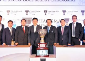 Tournament organizers and former Chiang Mai Governor Wichien Puthiwinyoo are shown with the Chiang Mai Golf Classic trophy.