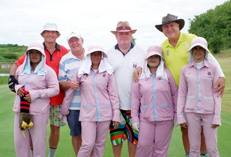 Bill, Joe, Woolly and Rosco pose with their caddies at Silky Oak.