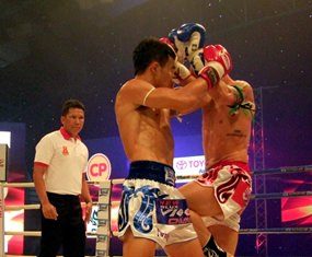 Fighters are shown in action at the Muay Thai Vigo Championship held in Chonburi city, Friday, July 25.