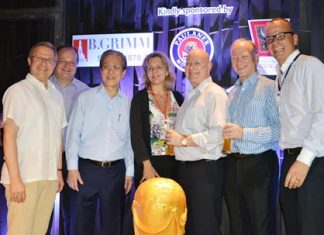 The main sponsors of the night pose for a group photo. (L to R) Andre Brulhart, General Manager of the Centara Grand Mirage Beach Resort Pattaya, Greg Watkins, Executive Director of the BCCT, Phongsakdi Chakshuvej, President of the GTCC, Judy Benn, Executive Director of the AmCham, Graham Macdonald, President of the SATCC, Simon Landy, Executive Chairman of Colliers International, and Jorg Buck, Executive Director of the GTCC.