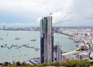 Pattaya officials have halted construction of a 53-story condominium and hotel project at Bali Hai Pier that sparked an Internet firestorm after photos showing the tower obstructing a classic Pattaya viewpoint went viral online. Mayor Itthiphol Kunplome stated that the project - first launched in 2004 - has continually followed correct and fully transparent legal processes and he urged anyone alleging that shortcuts were taken to investigate the various hearings and reports themselves.