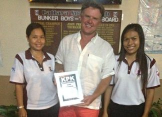 Colin Greig receives the KPK voucher from The Ranch girls.